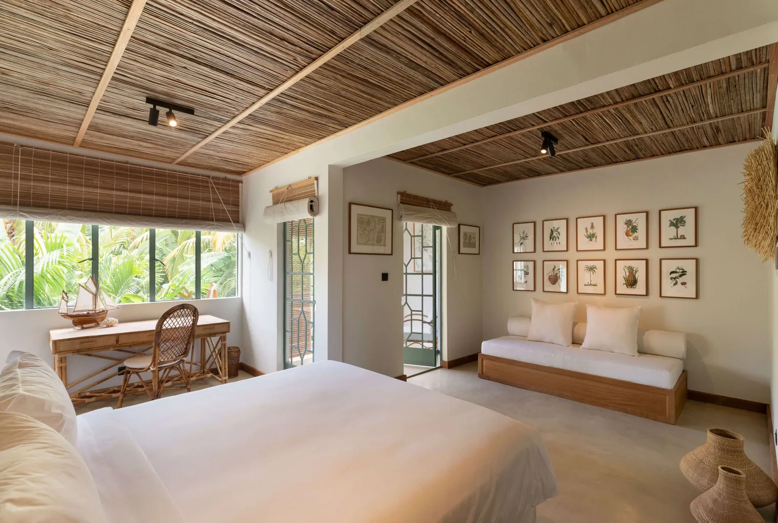 Deluxe Double Suite bedroom, generous in size, with a daybed and desk