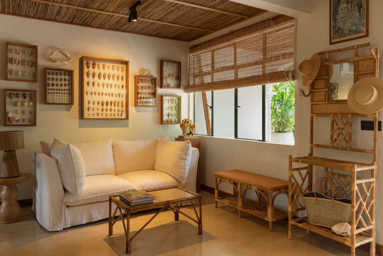 Deluxe Double Suite living area with bespoke rattan pieces handcrafted in Mauritius
