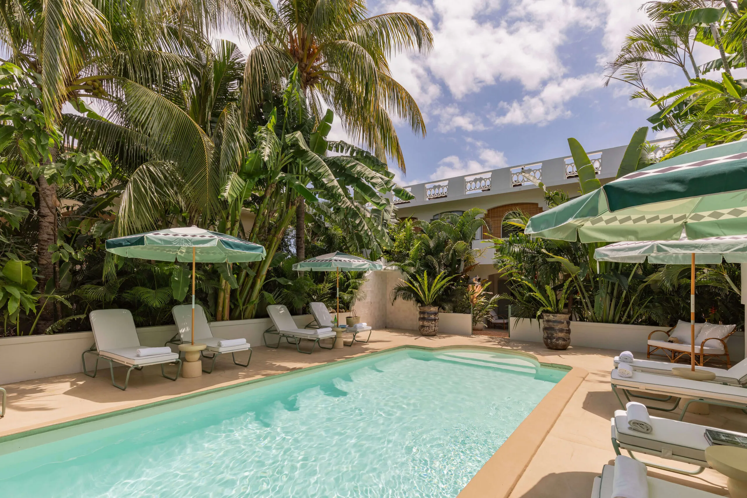 A pool shared by only three suites, generous in scale and unhurried